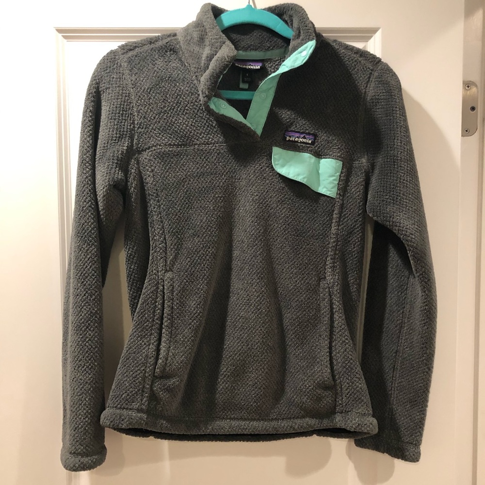 Grey patagonia with blue pocket